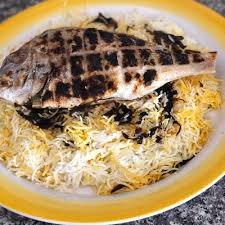 سمكه مشويه مع ارز وبيبسى